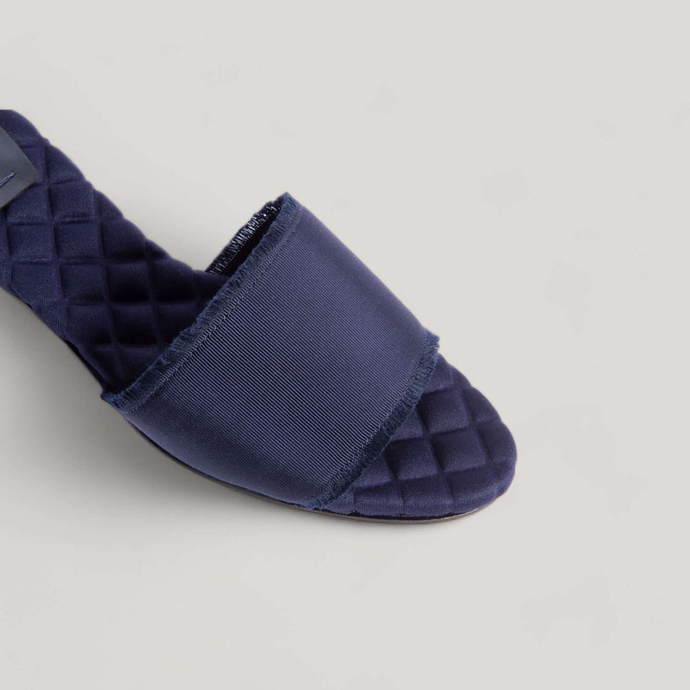 Navy grosgrain sandals by AERA with cushioned insole, designed for comfort and day-to-night wear transitions. Vegan, designer, and sustainable shoes.